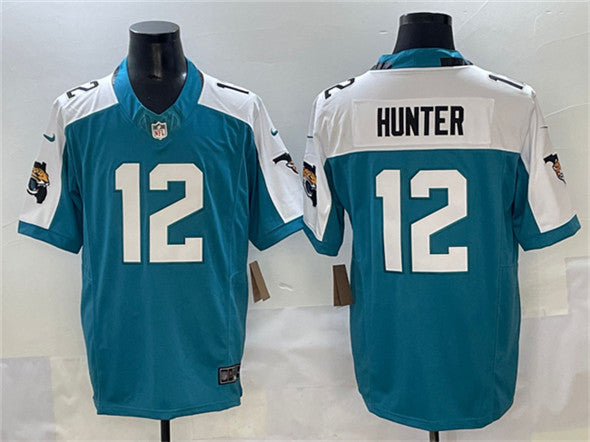 Travis Hunter Jacksonville Jaguars teal-white jersey