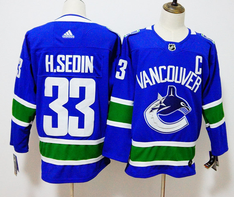 Henrik Sedin Vancouver Canucks blue jersey