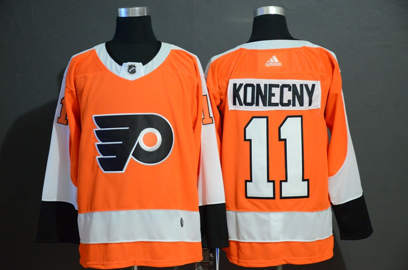 Travis Konecny Philadelphia Flyers orange jersey