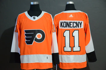 Travis Konecny Philadelphia Flyers orange jersey