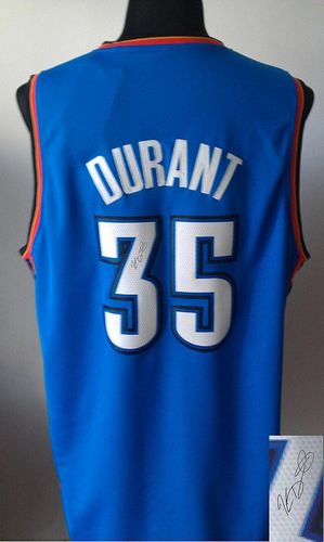 Autographed Thunder blue jersey